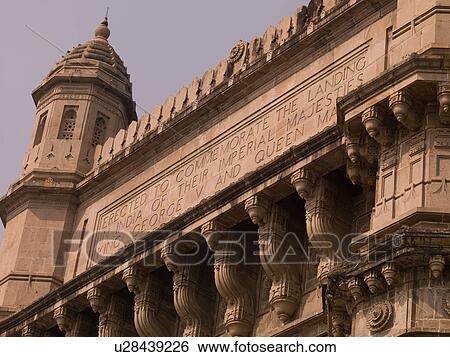 Stock Photograph - Plaque on building in Mumbai India. Fotosearch