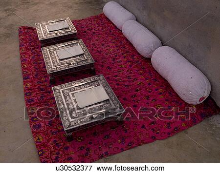 Stock Photo - "Rajasthan, India - pillows on a rug". Fotosearch