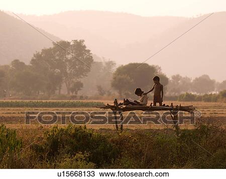 Stock Image - "Rajasthan, India - rural landscape". Fotosearch