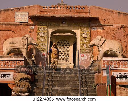Stock Photography - Woman decending stairs in Rajasthan India. Fotosearch