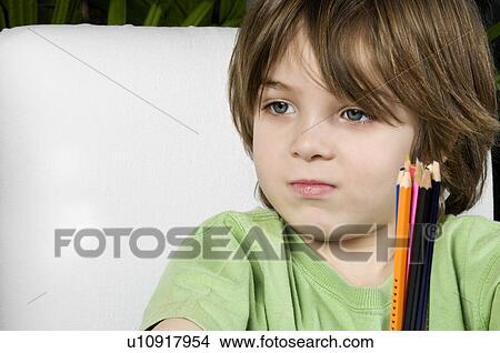 Picture - Boy with colored pencils. Fotosearch