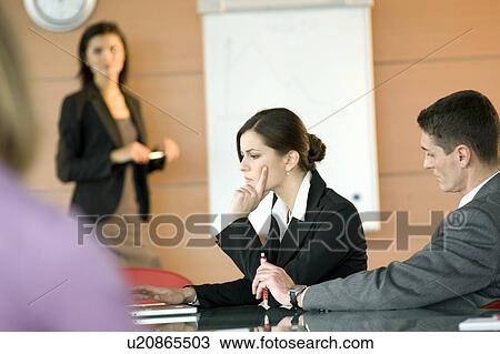 Business people at a presentation View Large Photo Image Stock Image - Business people at a presentation. Fotosearch