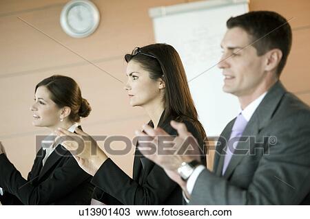 Business people at presentation clapping View Large Photo Image Stock Image - Business people at presentation clapping. Fotosearch