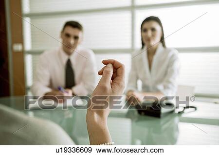 Business people interviewing professional woman View Large Photo Image Stock Photo - Business people interviewing professional woman. Fotosearch