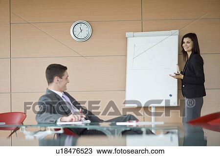 Businesswoman giving a presentation View Large Photo Image Stock Image - Businesswoman giving a presentation. Fotosearch