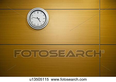 Clock on office wall View Large Photo Image Stock Photography - Clock on office wall. Fotosearch