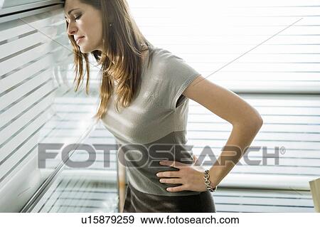 Professional woman looking worried View Large Photo Image Stock Photo - Professional woman looking worried. Fotosearch
