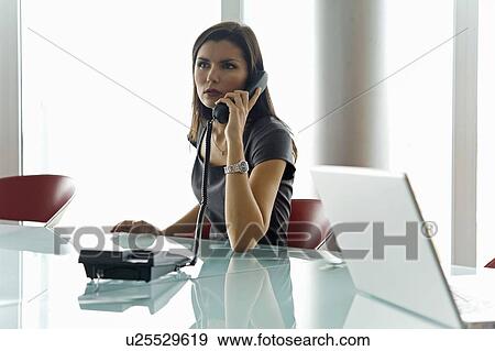 Professional woman on telephone View Large Photo Image Stock Photo - Professional woman on telephone. Fotosearch