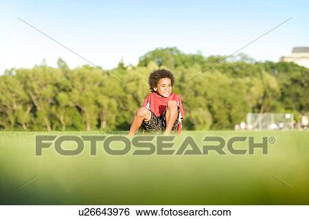 8 year old boy seated on the grass, Winnipeg, Canada View Large Photo Image Stock Photograph - 8 year old boy seated on the grass, Winnipeg, Canada. Fotosearch