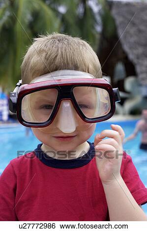 Boy wearing snorkle mask, Camagüey, Cuba View Large Photo Image Stock Photograph - Boy wearing snorkle mask, Camagüey, Cuba. Fotosearch