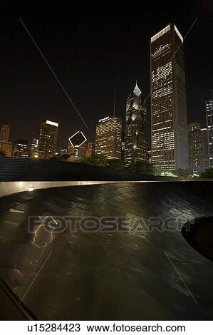 Stock Image - Cityscape at night, Chicago, USA. Fotosearch