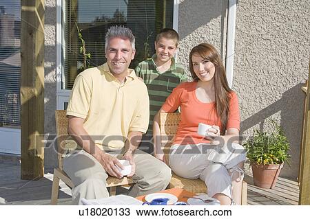 Family portrait on deck, Winnipeg, Canada View Large Photo Image Stock Image - Family portrait on deck, Winnipeg, Canada. Fotosearch