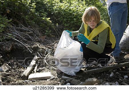 Female Cleaning up under Bridge, Vancouver, Canada View Large Photo Image Stock Photo - Female Cleaning up under Bridge, Vancouver, Canada. Fotosearch