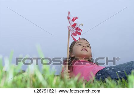 Five year old girl in park with pin wheel, Winnipeg, Canada View Large Photo Image Stock Image - Five year old girl in park with pin wheel, Winnipeg, Canada. Fotosearch