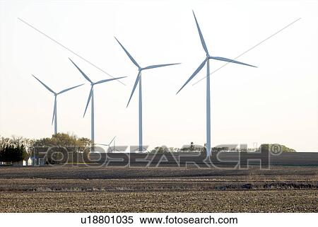 Stock Photography - Four wind turbines. Fotosearch