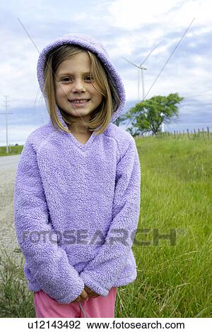 Girl standing in front of wind turbine, Tiverton, Bruce Peninsula, Ontario View Large Photo Image Stock Image - Girl standing in front of wind turbine, Tiverton, Bruce Peninsula, Ontario. Fotosearch