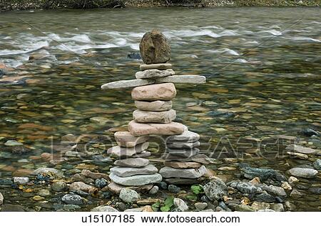 Inukshuk by river, Gaspesie, Quebec View Large Photo Image Stock Photography - Inukshuk by river, Gaspesie, Quebec. Fotosearch