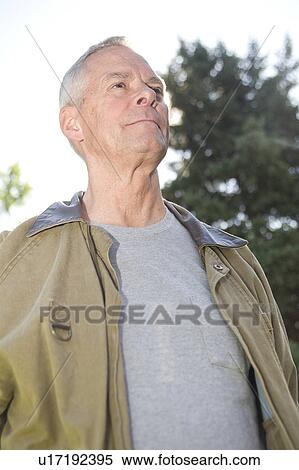 Low angle portrait senior man, Winnipeg, Canada View Large Photo Image Stock Photography - Low angle portrait senior man, Winnipeg, Canada. Fotosearch