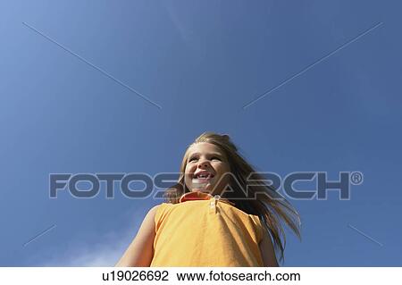 Low angle six year old girl, Winnipeg, Canada View Large Photo Image Stock Image - Low angle six year old girl, Winnipeg, Canada. Fotosearch