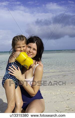 Mother and daughter at the beach, Camagüey, Cuba View Large Photo Image Stock Image - Mother and daughter at the beach, Camagüey, Cuba. Fotosearch