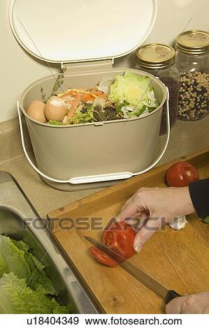 Stock Photo - Organic Recycling, kitchen compost pail. Fotosearch