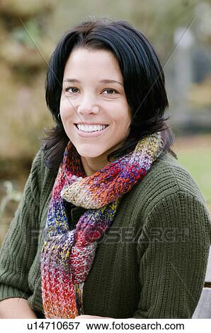 Portrait of young woman with colourful scarf outdoors, Vancouver, British Columbia View Large Photo Image Stock Photo - Portrait of young woman with colourful scarf outdoors, Vancouver, British Columbia. Fotosearch