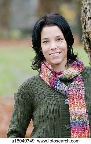 Portrait of young woman with colourful scarf outdoors, Vancouver, British Columbia View Large Photo Image Stock Photo - Portrait of young woman with colourful scarf outdoors, Vancouver, British Columbia. Fotosearch