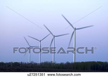 Stock Image - Row of wind turbines. Fotosearch
