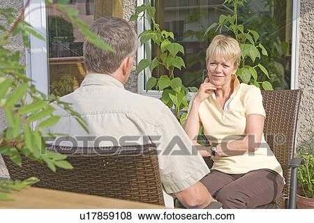 Senior couple enjoying coffee on deck, Winnipeg, Canada View Large Photo Image Stock Photo - Senior couple enjoying coffee on deck, Winnipeg, Canada. Fotosearch