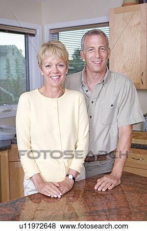 Senior couple in kitchen, Winnipeg, Canada View Large Photo Image Stock Photo - Senior couple in kitchen, Winnipeg, Canada. Fotosearch