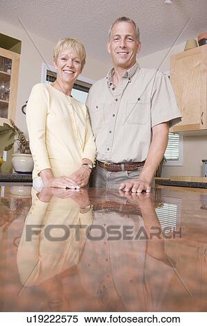 Senior couple in kitchen, Winnnipeg, Canada View Large Photo Image Stock Photography - Senior couple in kitchen, Winnnipeg, Canada. Fotosearch