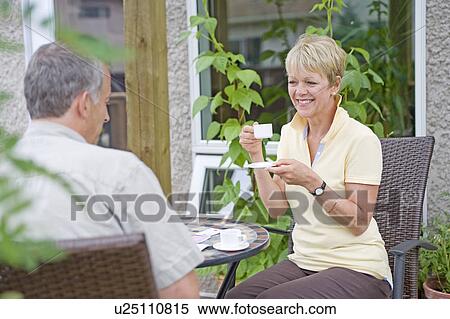 Senior couple playing cards on deck, Winnipeg, Canada View Large Photo Image Stock Photography - Senior couple playing cards on deck, Winnipeg, Canada. Fotosearch