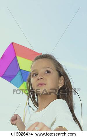 Seven year old girl with kite, Winnipeg, Canada View Large Photo Image Picture - Seven year old girl with kite, Winnipeg, Canada. Fotosearch