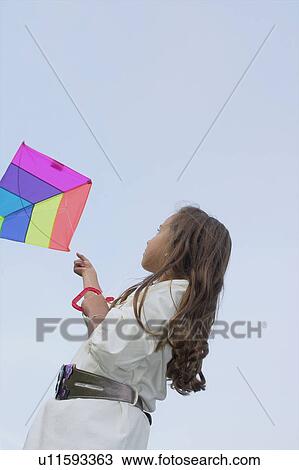 Seven year old girl with kite, Winnipeg, Canada View Large Photo Image Stock Image - Seven year old girl with kite, Winnipeg, Canada. Fotosearch