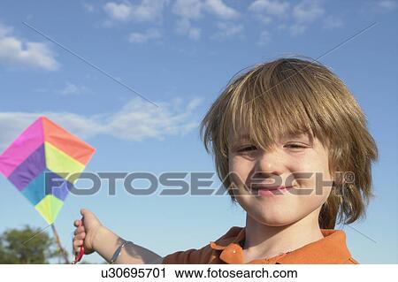 Six year old boy with kite, Winnipeg, Canada View Large Photo Image Stock Image - Six year old boy with kite, Winnipeg, Canada. Fotosearch