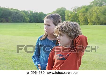 Six year old brother and 8 year old sister looking off, Winnipeg, Canada View Large Photo Image Stock Image - Six year old brother and 8 year old sister looking off, Winnipeg, Canada. Fotosearch
