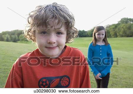 Six year old brother and 8 year old sister in park, Winnipeg, Canada View Large Photo Image Stock Image - Six year old brother and 8 year old sister in park, Winnipeg, Canada. Fotosearch