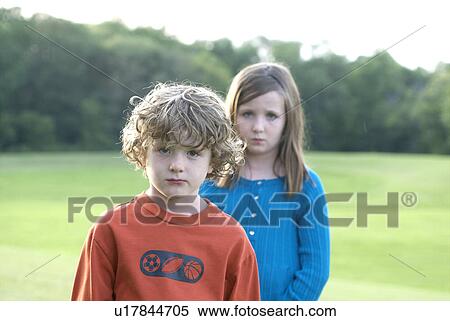 Six year old brother and 8 year old sister in park, Winnipeg, Canada View Large Photo Image Stock Photography - Six year old brother and 8 year old sister in park, Winnipeg, Canada. Fotosearch