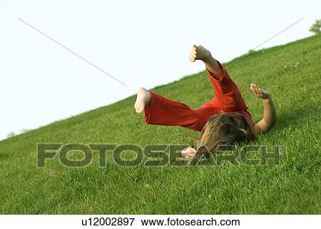 Stock Photo - Six year old girl down hill, Winnipeg, Canada. Fotosearch