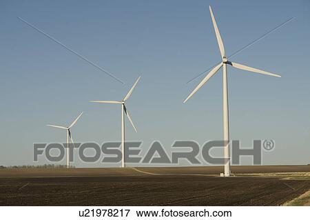 Three wind turbines View Large Photo Image Stock Photo - Three wind turbines. Fotosearch