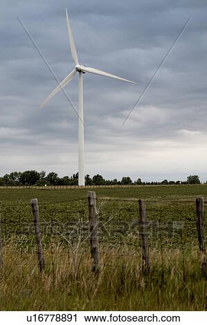 Wind turbine beyond wire fence, Tiverton, Bruce Peninsula, Ontario View Large Photo Image Stock Image - Wind turbine beyond wire fence, Tiverton, Bruce Peninsula, Ontario. Fotosearch