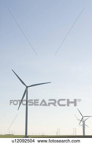 Wind turbines and hydroelectric towers View Large Photo Image Picture - Wind turbines and hydroelectric towers. Fotosearch