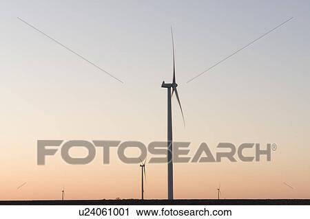 Wind turbines at sunset View Large Photo Image Stock Image - Wind turbines at sunset. Fotosearch