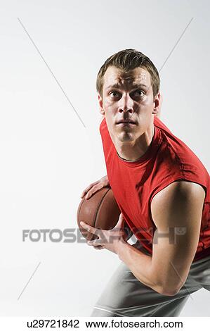 Stock Image - A basketball player. Fotosearch