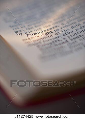 Stock Photography - A book with the focus on the word Foreclosure. Fotosearch