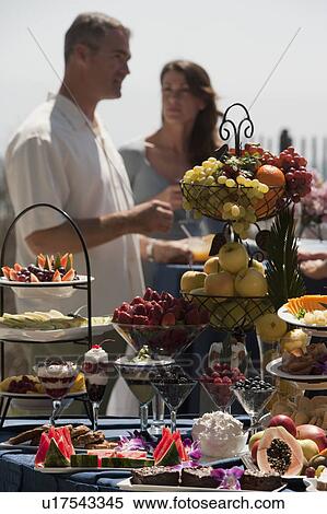 A buffet table at a party View Large Photo Image Stock Photography - A buffet table at a party. Fotosearch