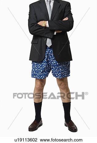 Stock Image - A businessman without pants. Fotosearch