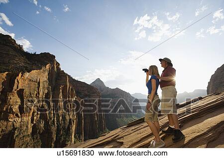 Stock Image - A couple at Red Rock. Fotosearch