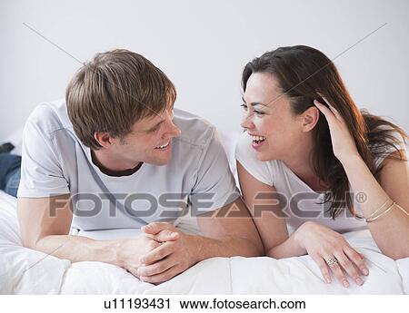 A couple in bed View Large Photo Image Stock Image - A couple in bed. Fotosearch