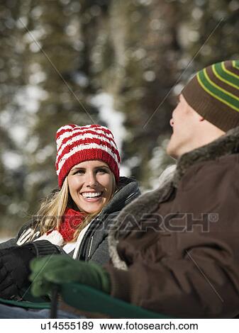 A couple outdoors in the snow View Large Photo Image Stock Photo - A couple outdoors in the snow. Fotosearch